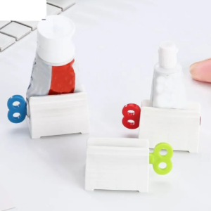 Squeezer clip dispenser toothpaste